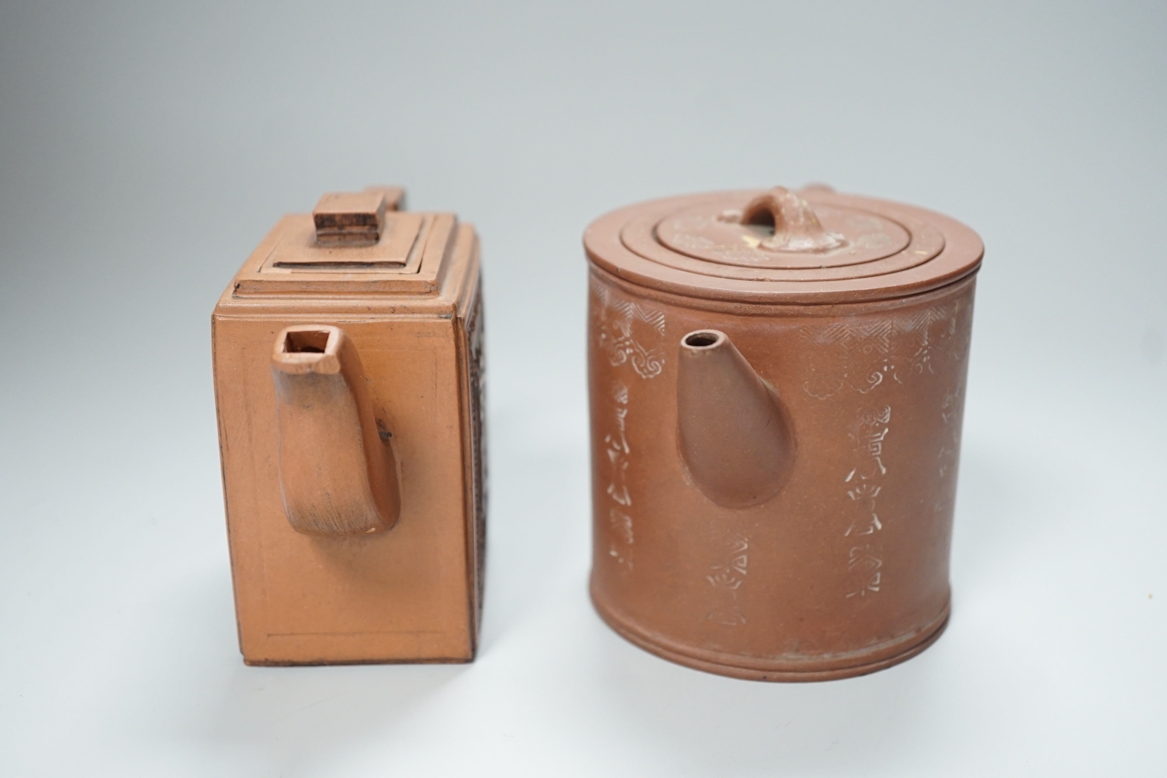 Two Chinese Yixing teapots and covers, tallest 10.5cm